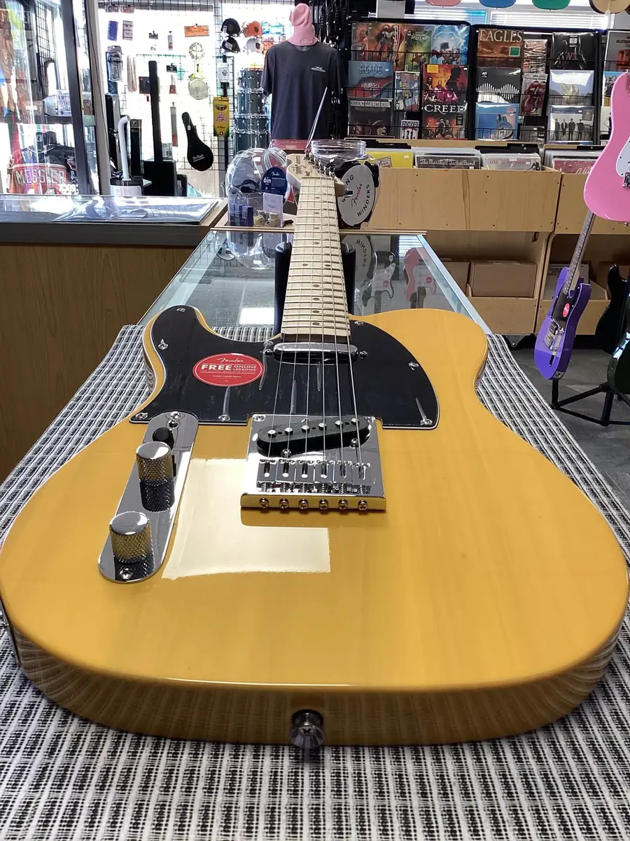 Butterscotch Fender Telecaster electric guitar on the store counter